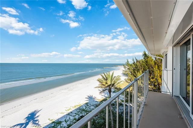 Discover the potential of this beachfront condo awaiting your personal touch. This unique, double-un
