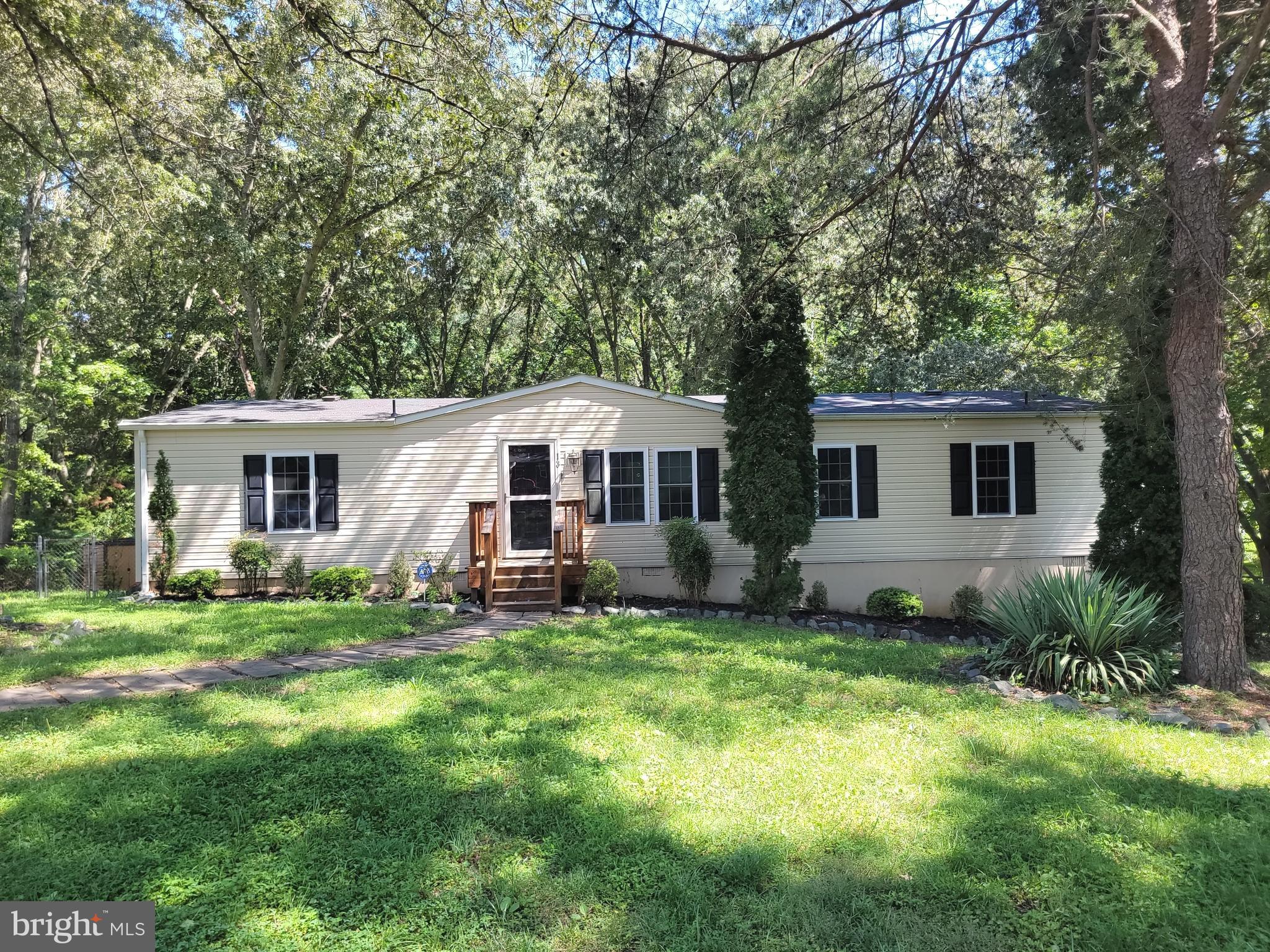 Private and quite neighborhood. It offers 4 bedrooms, 2 bathrooms on 1 acre lot back to trees. New carpet, freshly painted, SS appliances, granite countertop, fenced backyard with a large shed. No HOA. Close to VRE, Quantico, Route 1 and I-95. Schedule your appointment! Open house on 8/7.