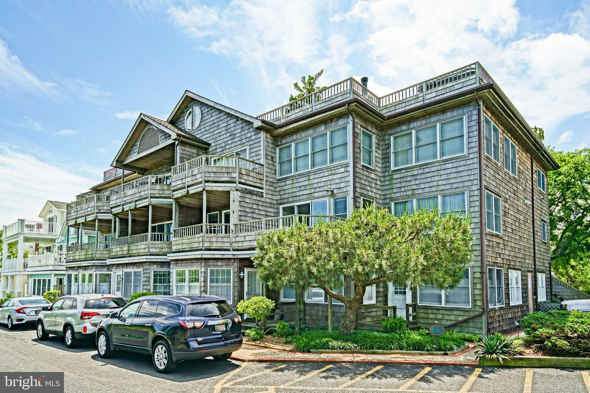ONE OF A KIND ON THE BEACH - Take a front-row seat to panoramic sunsets, sea breezes, beach dunes and the Delaware Bay from the sheltered deck of this airy multi-level condo. Walk to Historic Lewes shops and restaurants and bike to the Cape Henlopen State Park, Junction & Breakwater, and Gordons Pond Bike Trails.