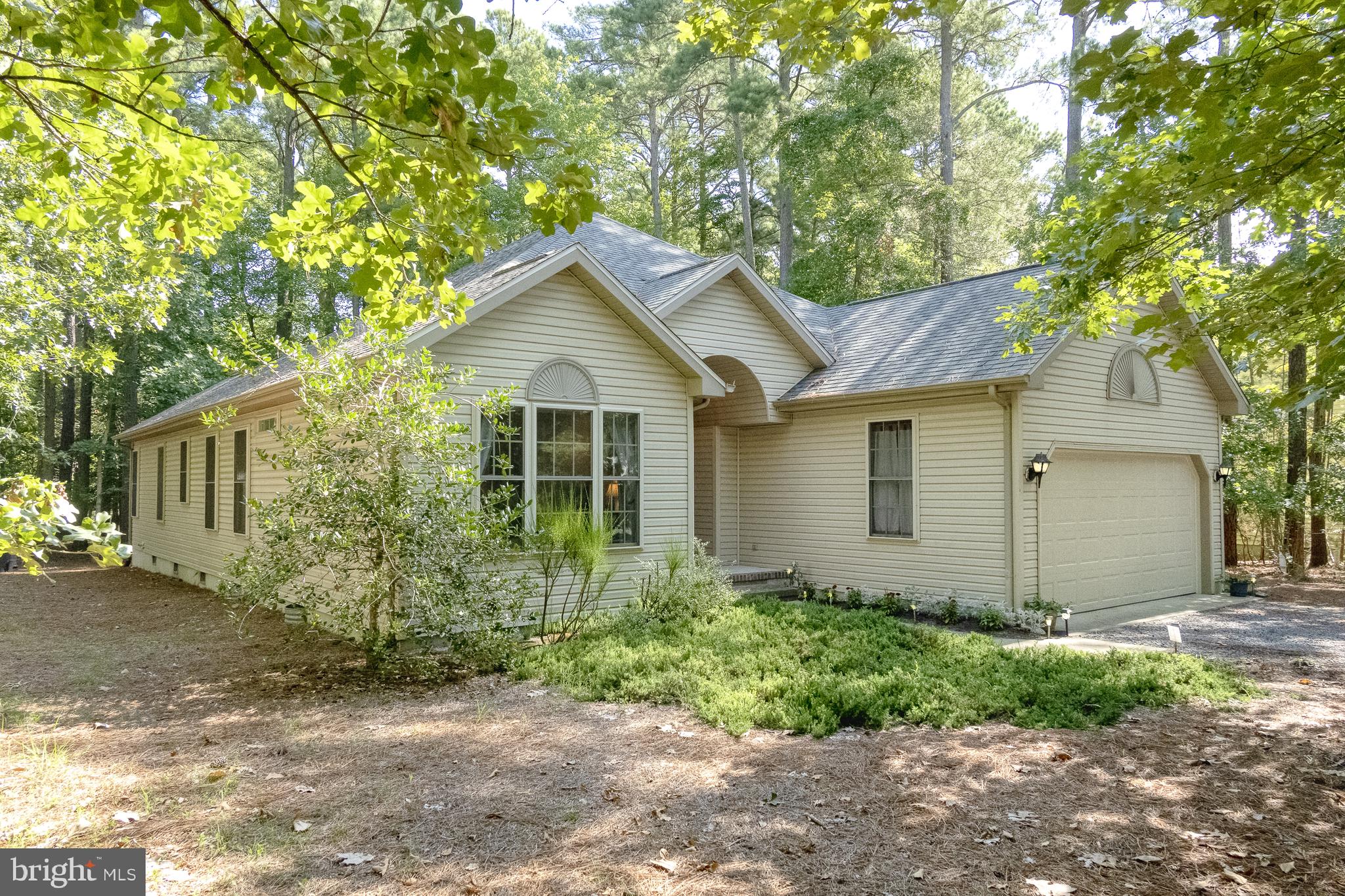 Welcome home to your 3 bedroom, 2 bath, and 2 car garage on a wonderful wooded lot. Living area offe