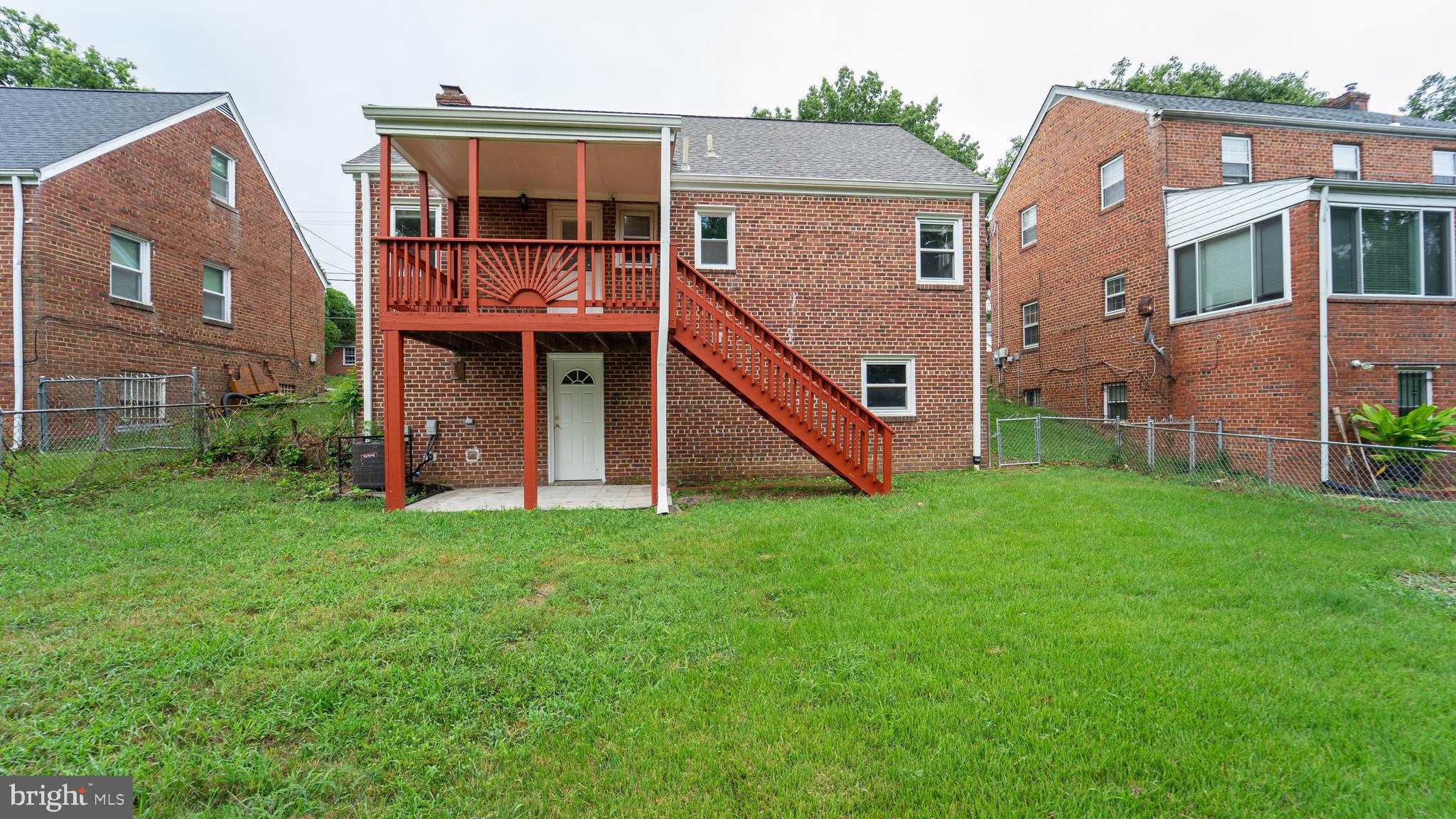 Gorgeous brick, single-family home with 3 levels with a basement, 5 bedrooms, and 2 bathrooms is rea