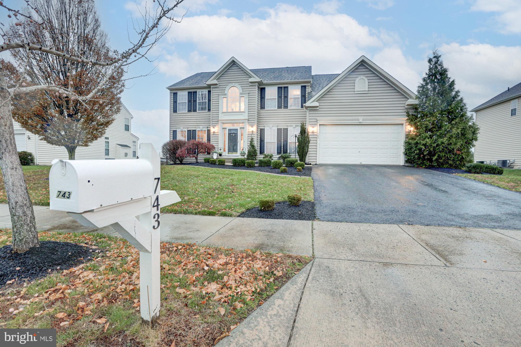 Come home for the holidays to 743 Wood Duck Court in the desirable neighborhood of Dove Run in Middl
