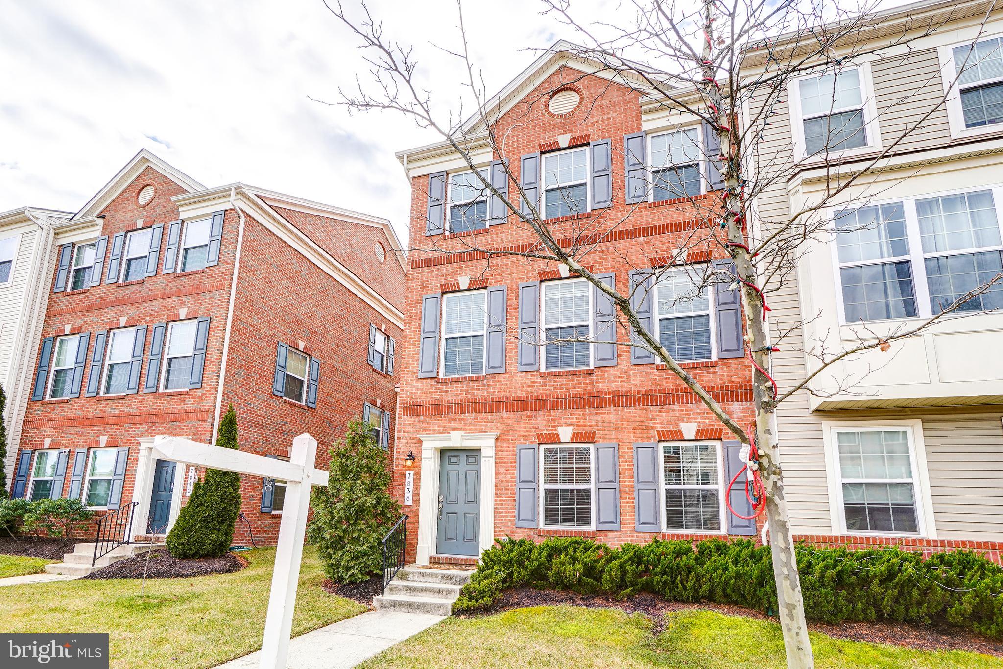Gorgeous luxury Brick Front end unit townhome in a great commuter location! Freshly painted, new Har
