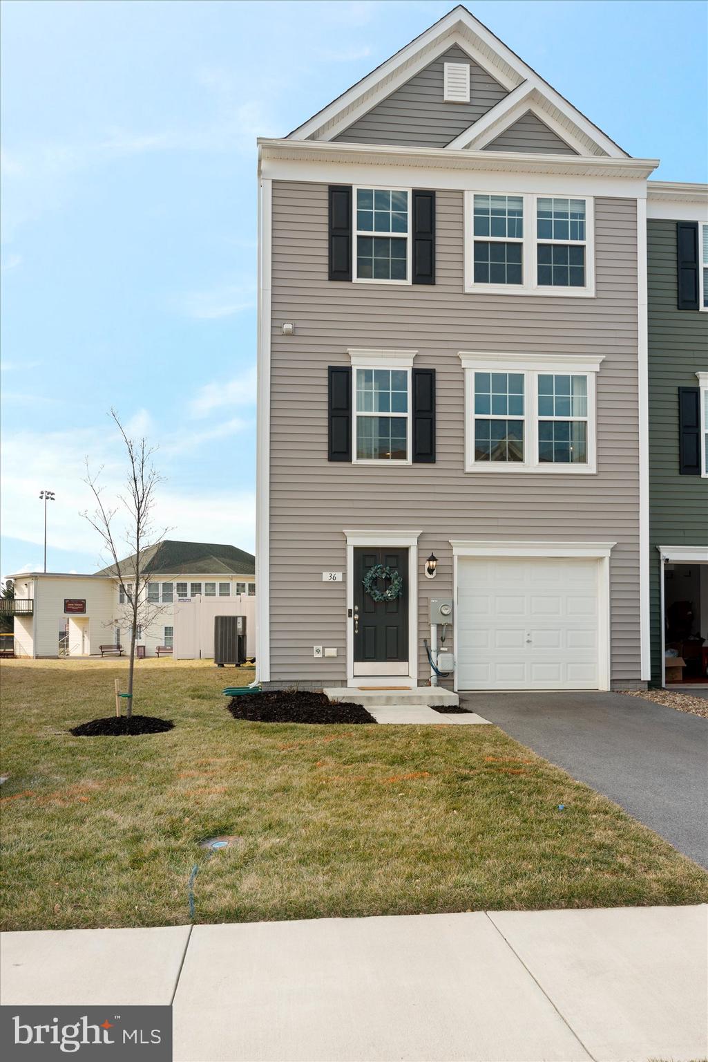 Immaculately maintained 3 level end unit townhome with one car garage in Briar Run Estates. The owne