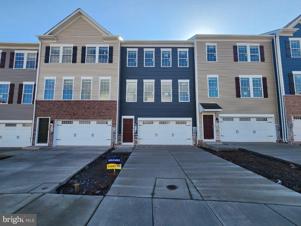 Opportunity awaits you in this well-appointed 3 story townhome that backs to greenspace! The Ansted 