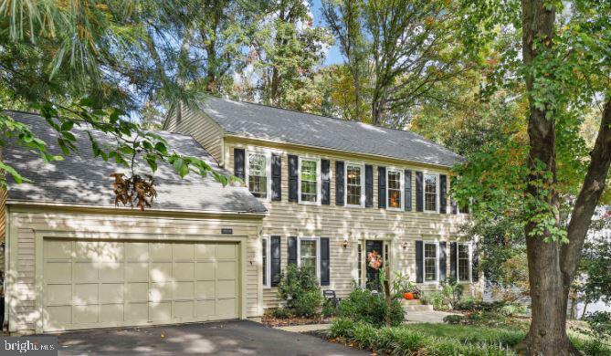 Welcome to this beautiful 3 level colonial home; situated on a serene ½ acre wooded lot situated on 