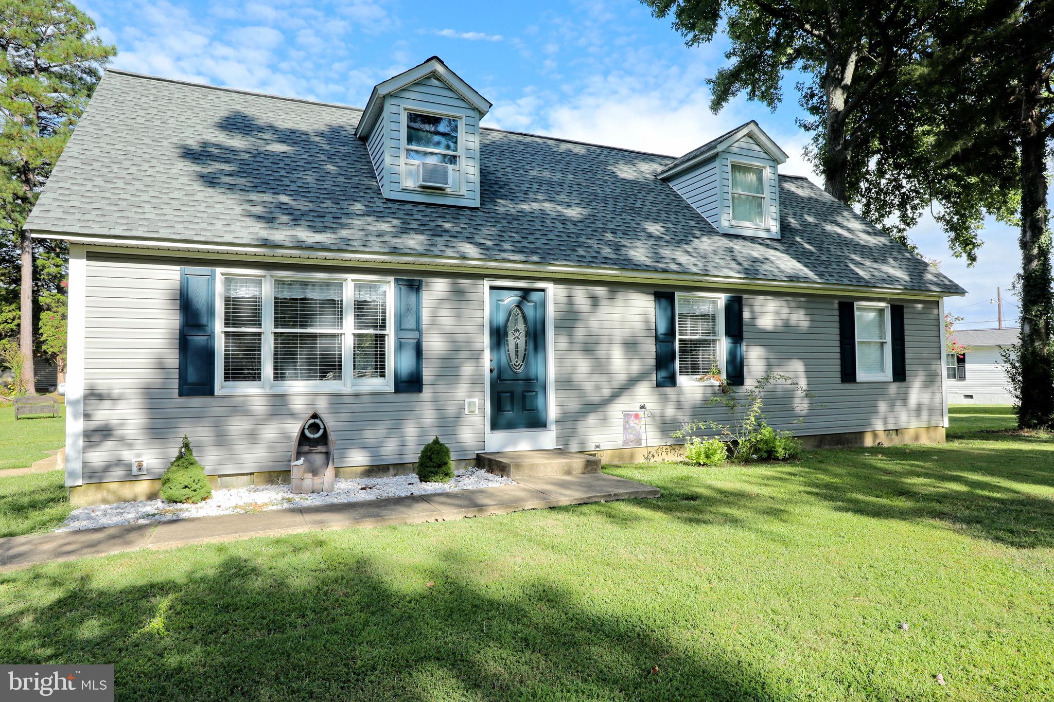 Don't miss this beautiful Cape Cod! 
Completely updated from top to bottom with new HVAC and hot wat