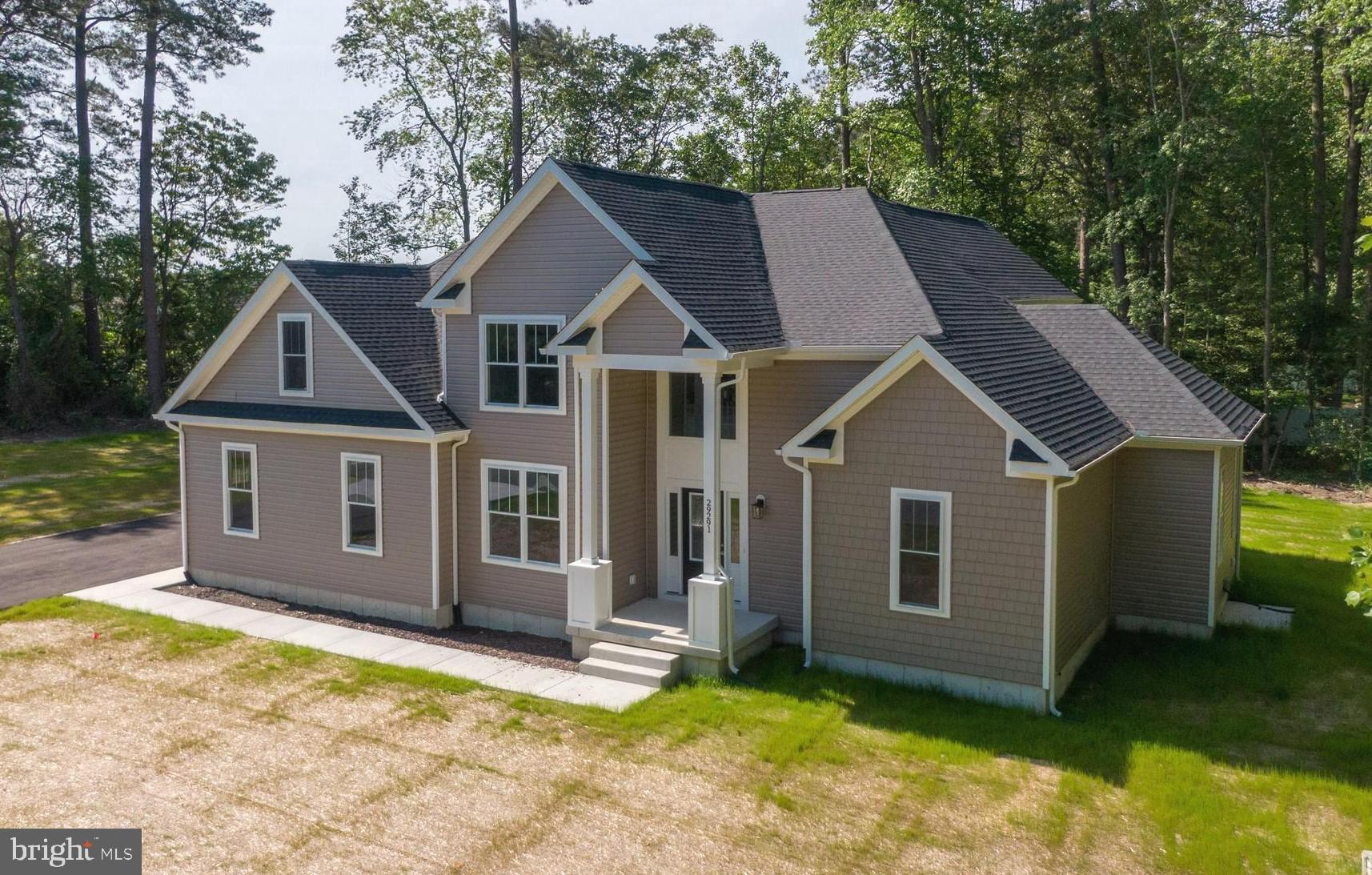 Brand New Custom Built Home on a .80 Acre Parcel in the Quiet and Private White Pine Cove community with a Beautiful Outdoor Setting just outside of Lewes and Milton with Quick and Easy access to Rt 1. A Spacious 2,800 Sq. Ft., 2 story, 4 bedroom, 3.5 bath Custom Home Built by JB Builders with a Bright Open Floor Plan with Beautiful Luxury Vinyl Plank flooring, a Custom Electric Fireplace, an Upscale Gourmet Kitchen and Formal Dining Room with a Relaxing Rear Patio, a Spacious 2 car Side Entry Garage and a Cement Conditioned Crawl Space with Sump Pump. All this along with being within minutes to all Beaches, Restaurants and Shopping . Don't Miss this Great Opportunity with a Beautiful Custom Built Home in a Quiet Setting with Terrific Value.