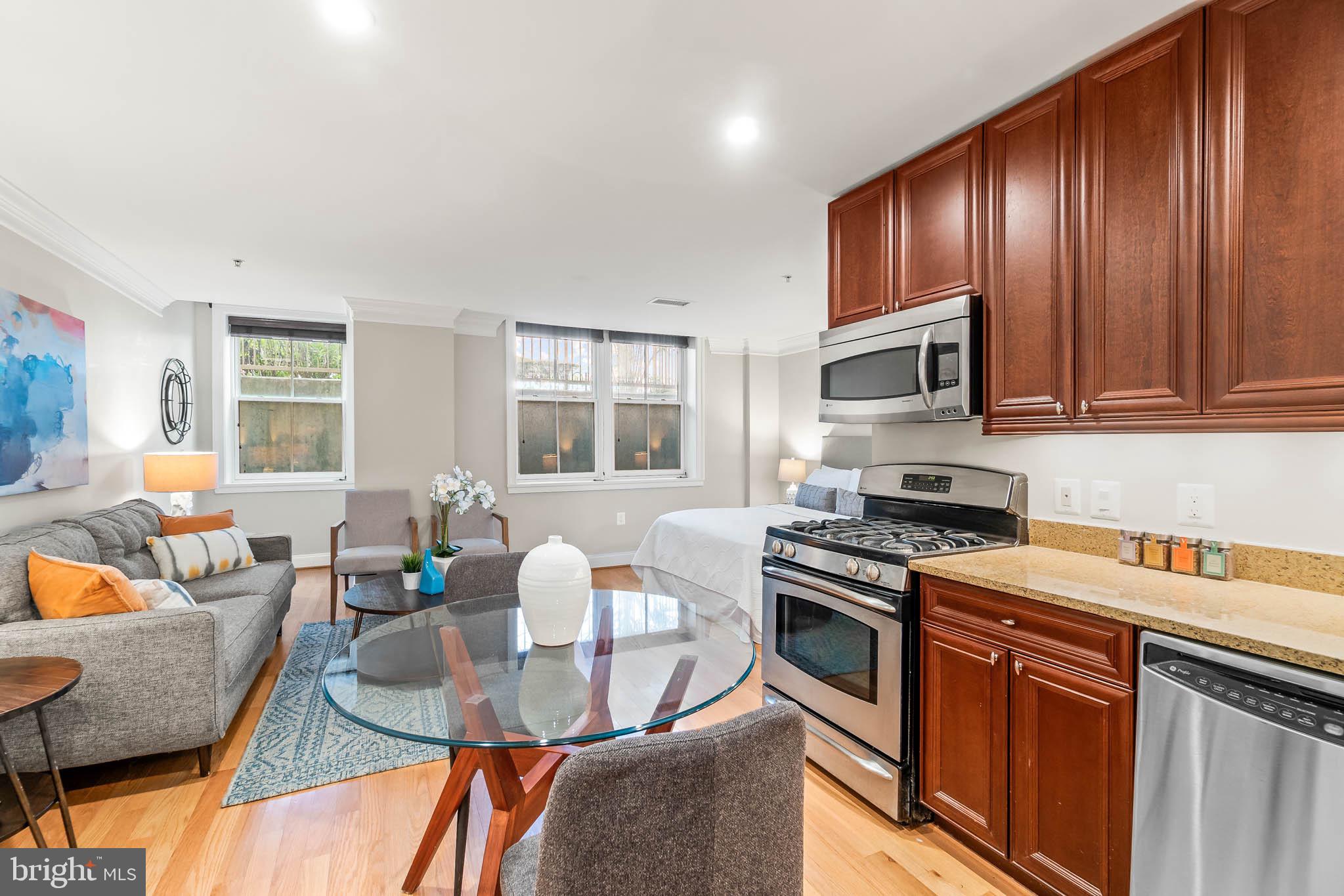 Live comfortably in this affordable studio at Logan Station: The entry-way leads to an eat-in kitche