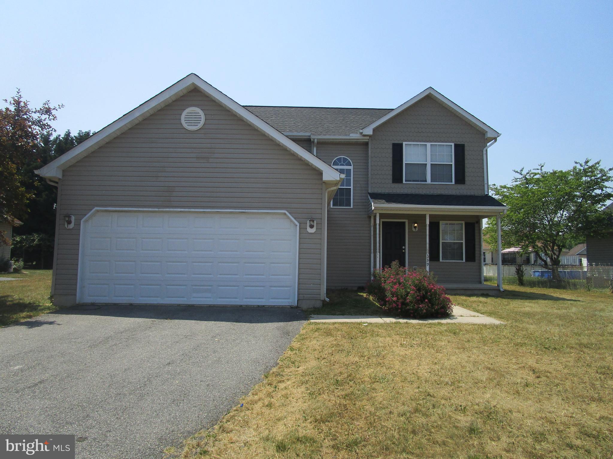 Wonderful opportunity to own this move-in ready, 2 story beauty in Middletown Village. Updated with 