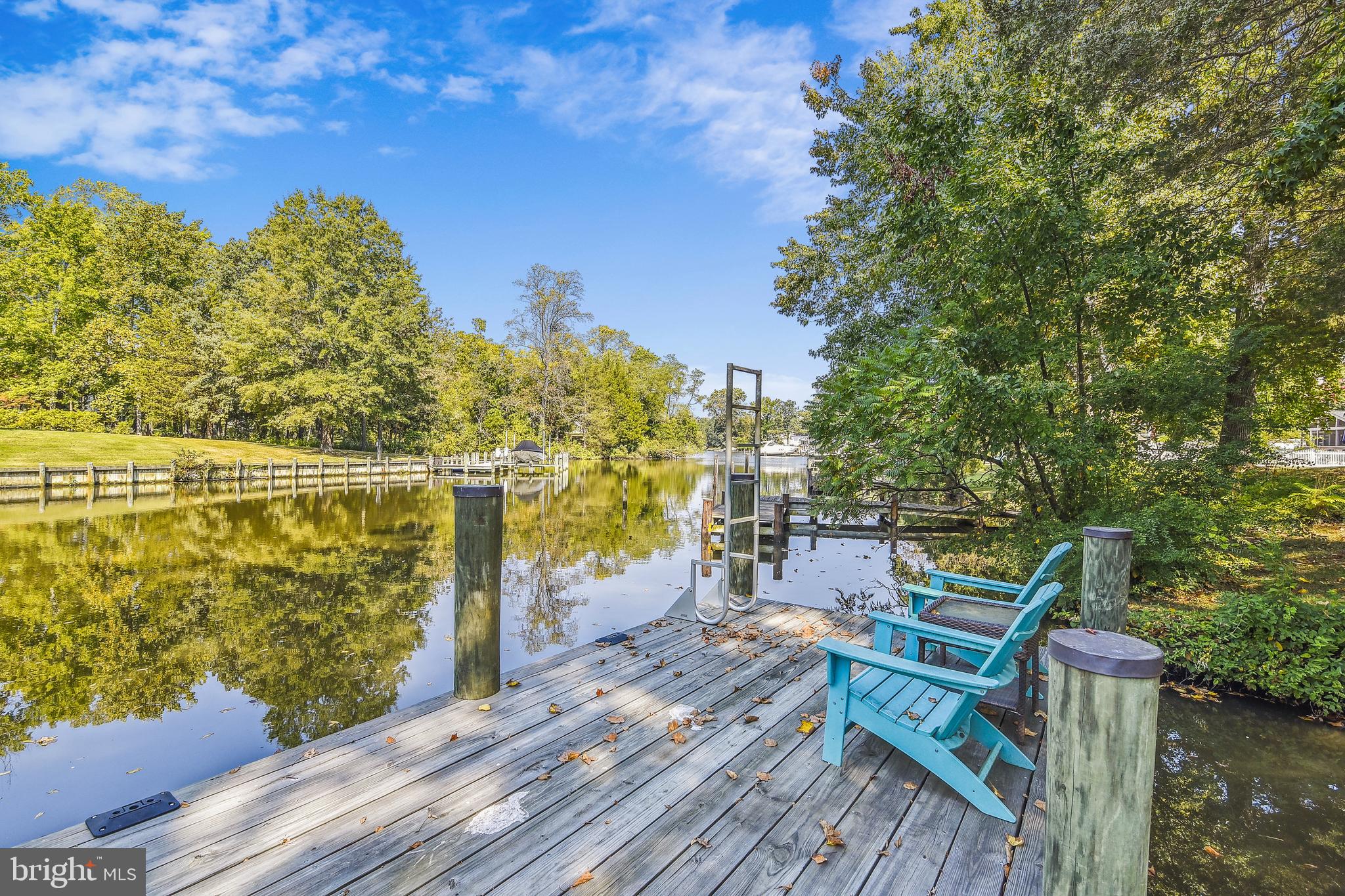 Discover waterfront living at its finest! This exquisite 3-bedroom, 2.5-bath Loch Haven Beach home b