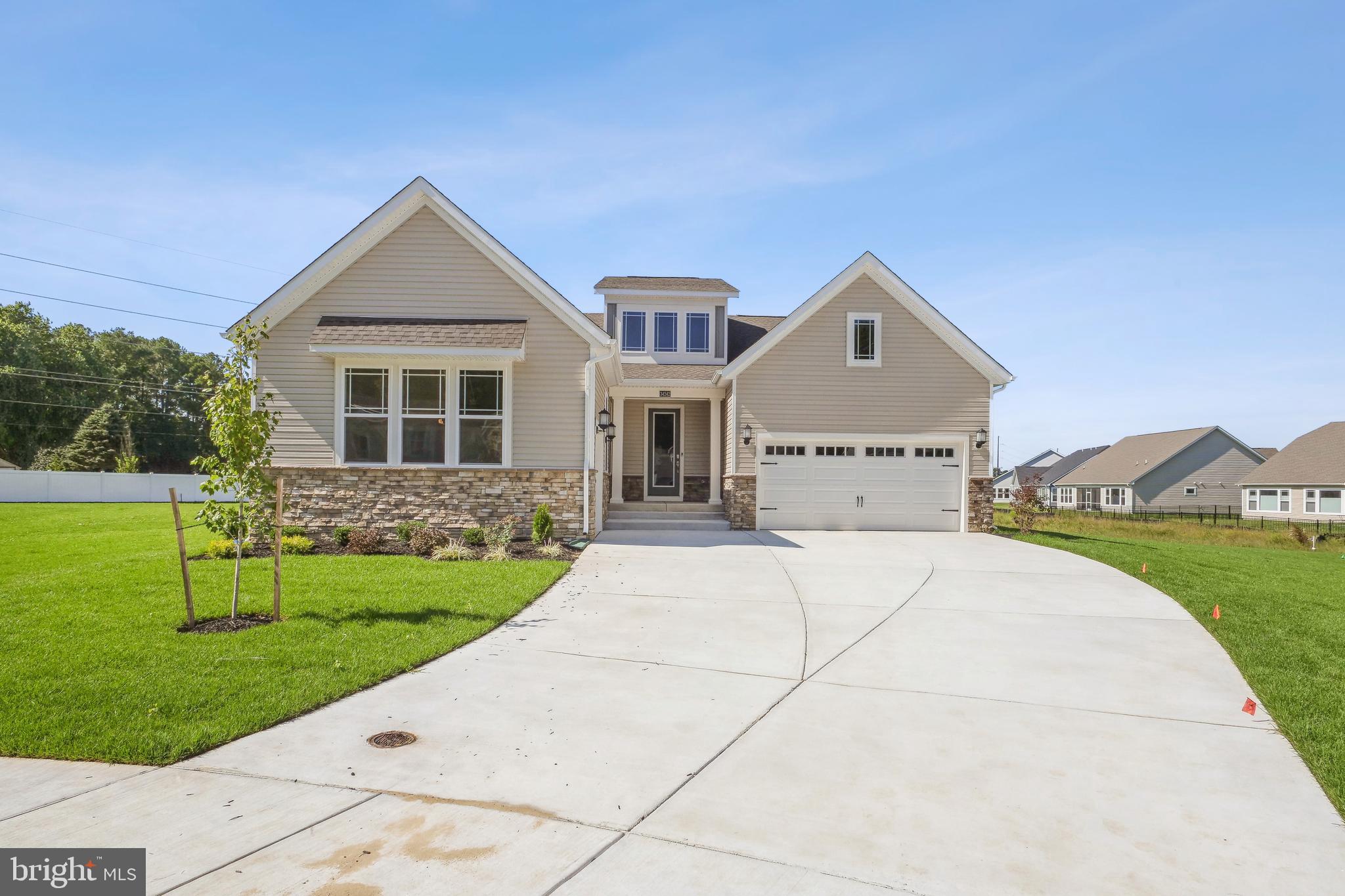 Welcome to Kindleton! Ready for quick delivery. This new home features a split three-car garage and 