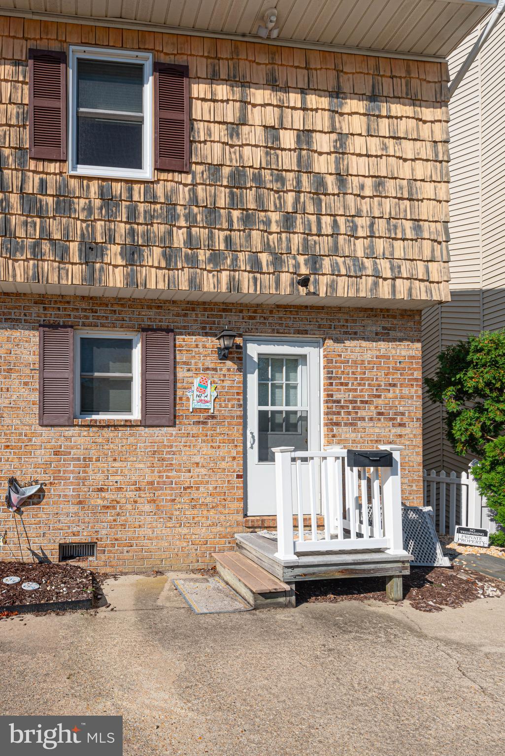 End-of-group townhouse with deeded boat slip on the canal.  Two large bedrooms with full bathrooms on 2nd floor. Half bath on 1st floor. No condo fees. Full-size washer/ dryer on 2nd floor where bedrooms are located. Sold as-is.