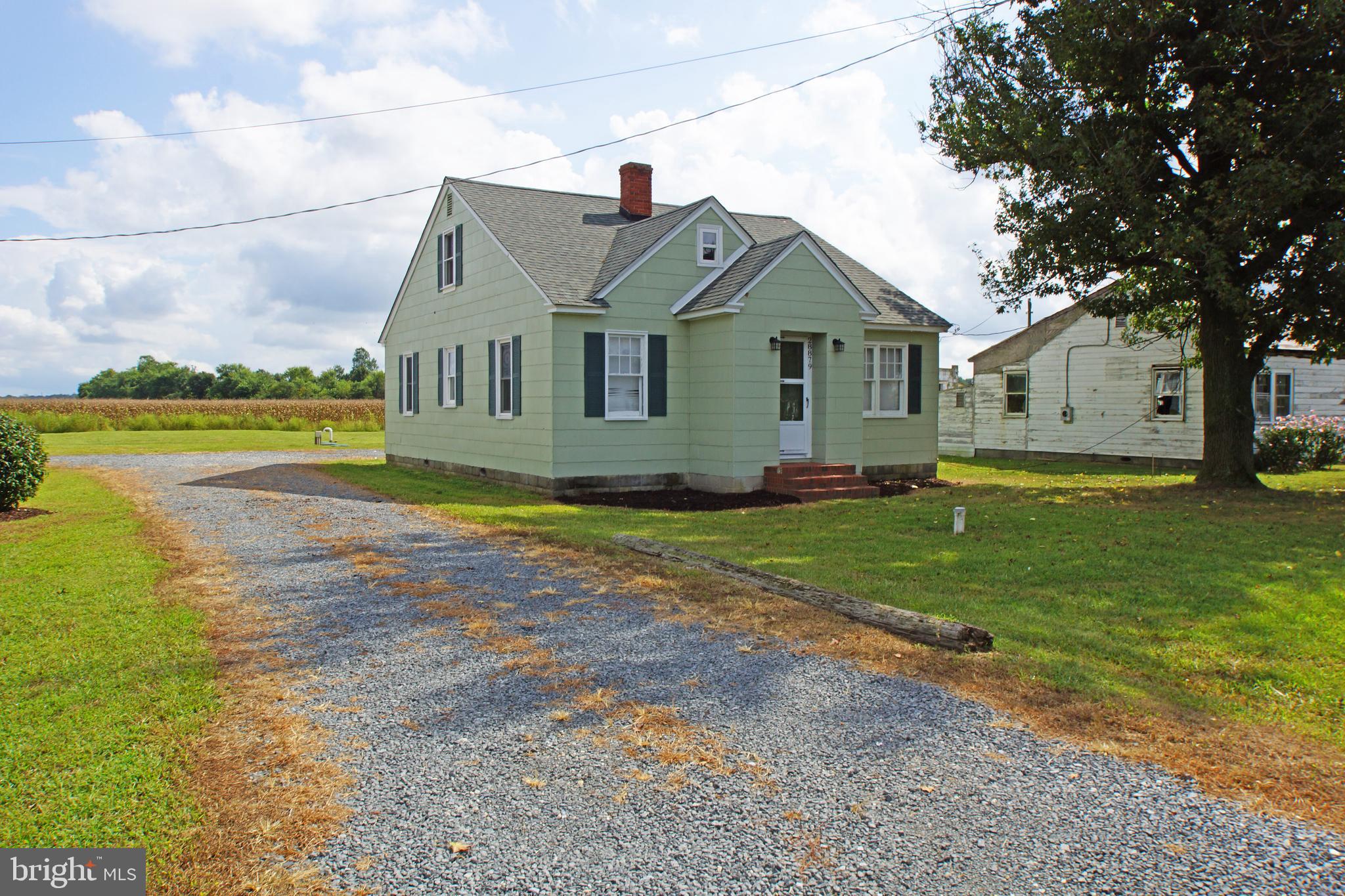 This less then 3 year old renovated ranch home, located outside town limits backing up to farm land 
