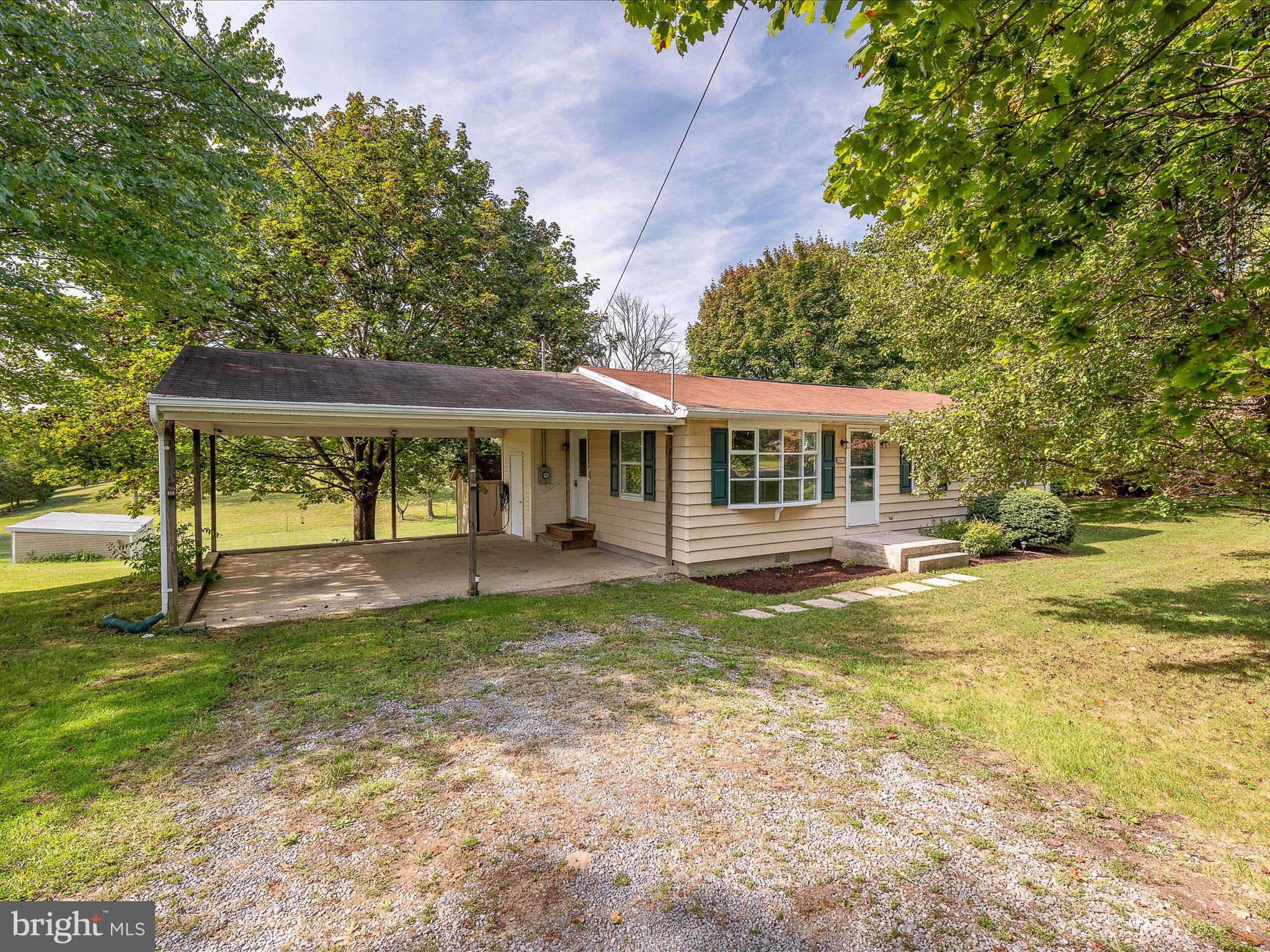This lovely 3 bedroom rancher has been newly renovated. Your lush, level lot is nearly 1/2 an acre. 