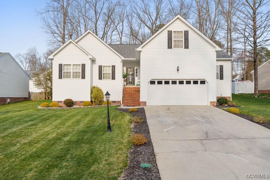Welcome to 14618 Clover Ridge Ln, Chesterfield. This beautiful home in Clover Hill Estates features 